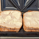cuisinart press with untoasted sandwiches ready to go